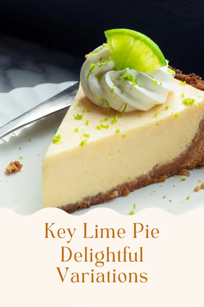 A slice of key lime pie with a graham cracker crust, topped with whipped cream, lime zest, and a fresh lime wedge.