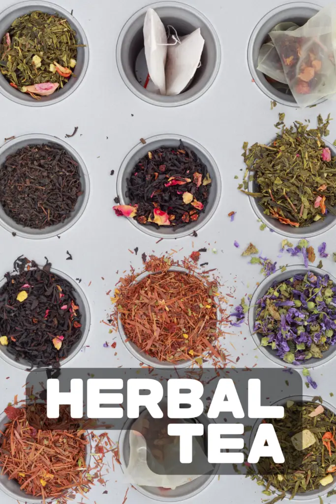 Various loose herbal teas and tea bags displayed in metal cups, showing different blends with flower petals and herbs similar to those used in Easter ham recipes for flavor infusion.